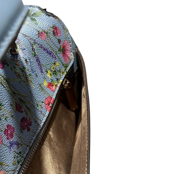 IMAN Global Chic convertible flap handbag with a floral design on the flap - Picture 4 of 14